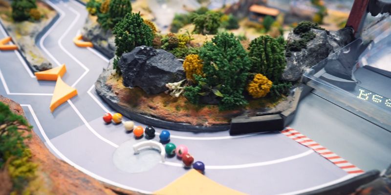 An image of Marbles colide in marble run
